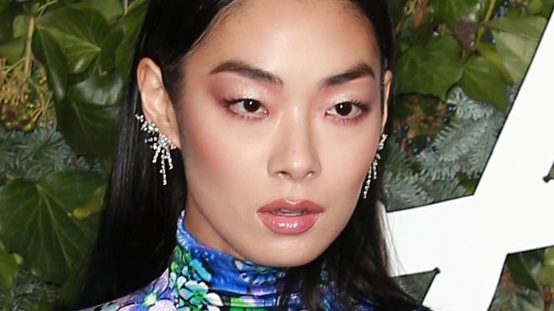 Rina Sawayama looking off camera