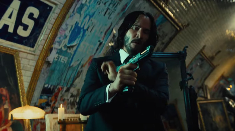 Keanu Reeves loading gun