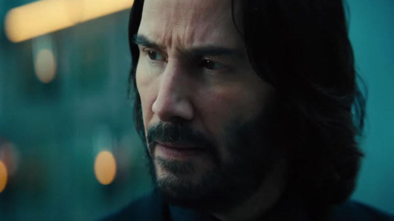 Keanu Reeves looking to the side