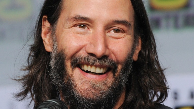 Keanu Reeves smiling 