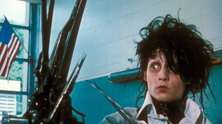 Edward looks at hands