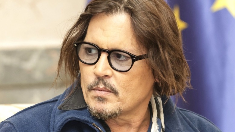 Johnny Depp looking intently at someone