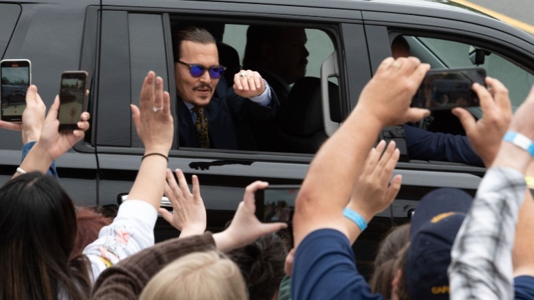 Johnny Depp waving to fans