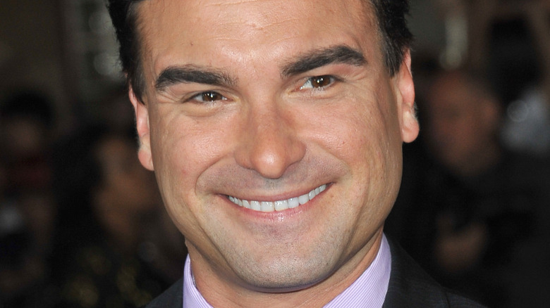 Johnny Galecki smiling at event