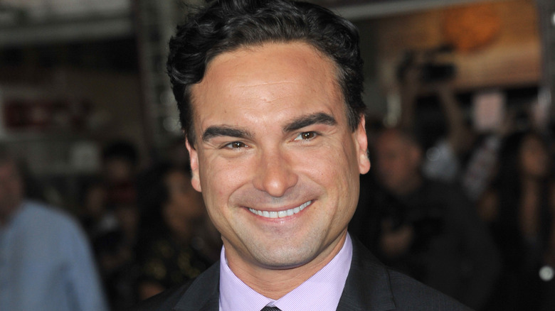 Johnny Galecki smiling at event