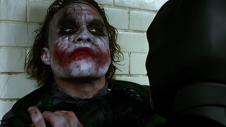 Batman threatening the Joker