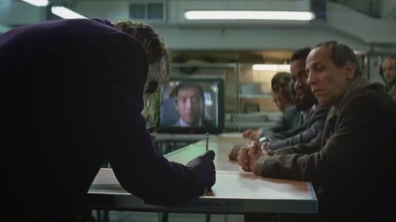 Joker performs his trick