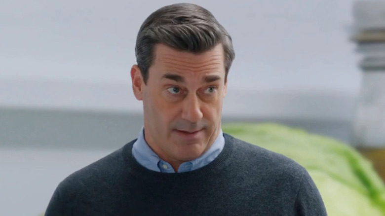 Jon Hamm incredulous in a refrigerator