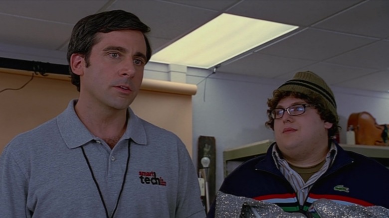 Andy standing by store customer