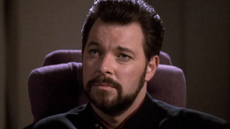 Riker sits at the conference table in Star Trek: The Next Generation