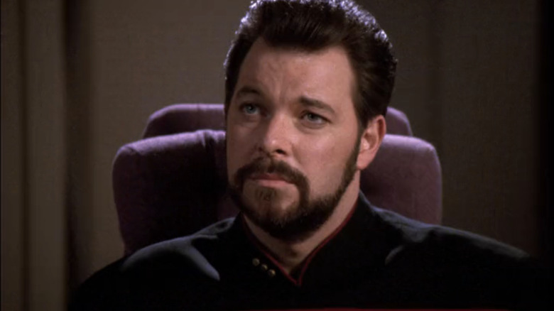 Riker sits at the conference table in Star Trek: The Next Generation