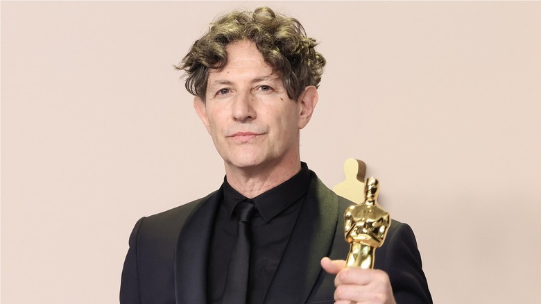 Jonathan Glazer poses with an Oscar