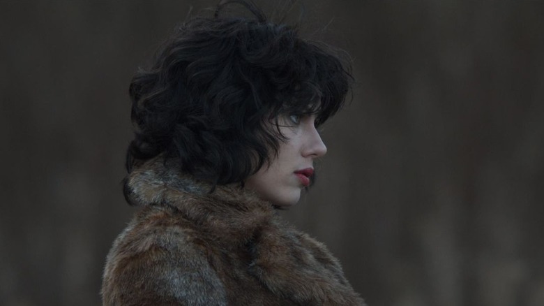 The Female walks in the woods in "Under the Skin' (2013)