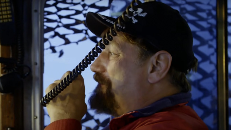Johnathan Hillstrand talking on a radio