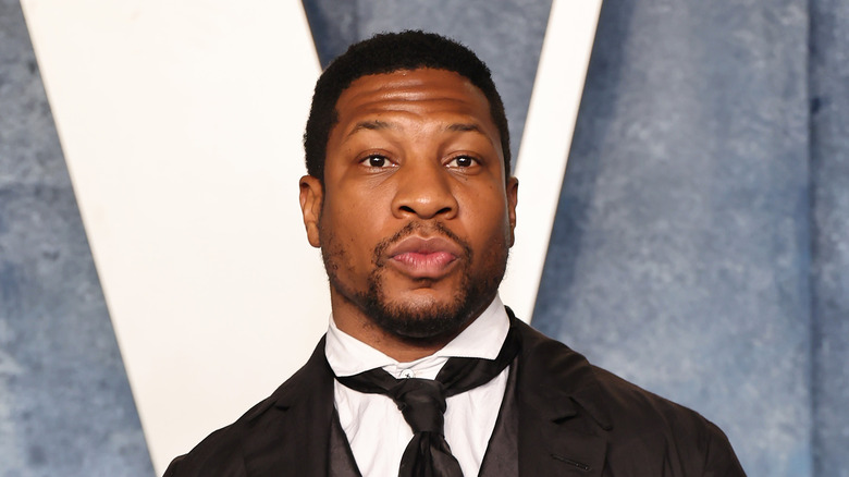 Jonathan Majors poses