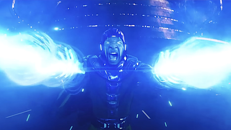 Kang shooting blue energy from his palms
