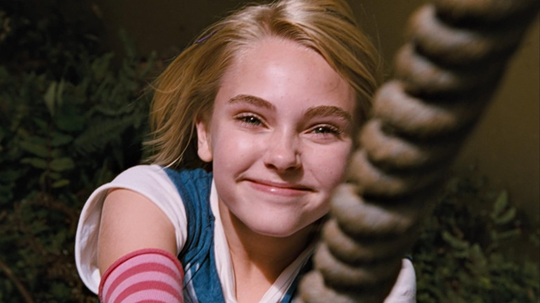 Leslie swinging on the rope over the creek in "Bridge to Terabithia"