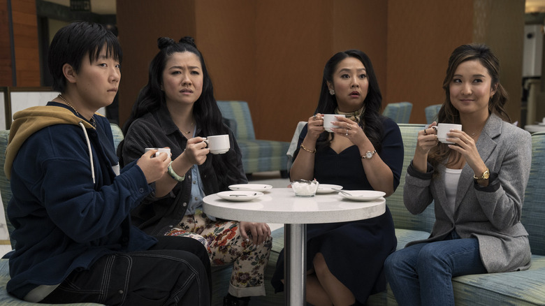 The four friends having tea