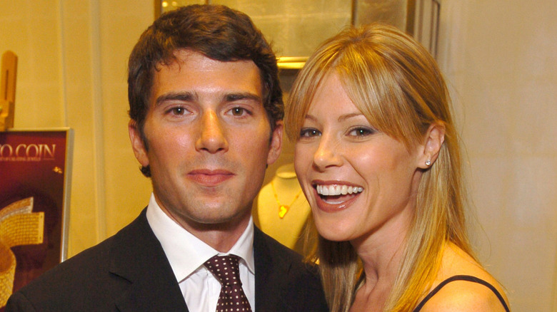 Scott Phillips and Julie Bowen smiling at an event