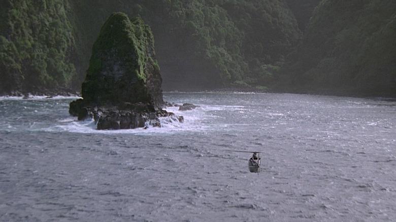 Heilcopter flying past Jurassic Rock