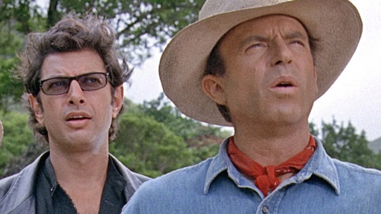Ian Malcolm (Jeff Goldblum), Alan Grant (Sam Neill) look up at new dinosaurs in Jurassic Park (1993)