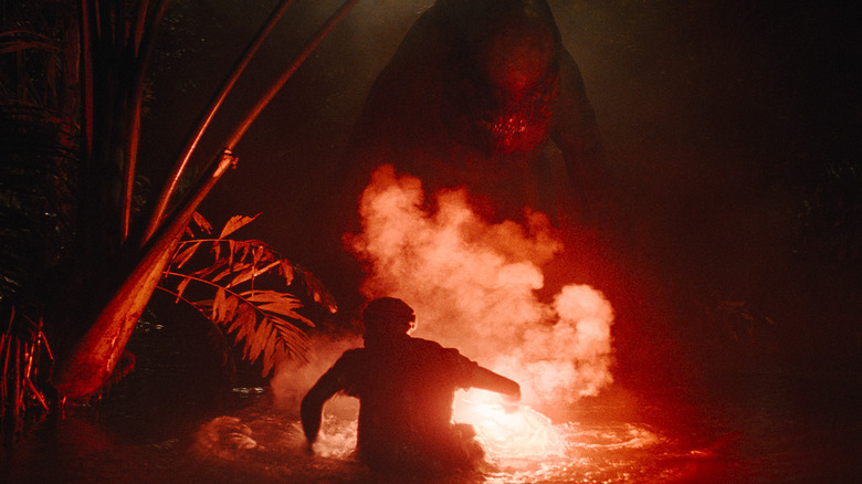 D-Rex looking scary behind smoke while lurking after human