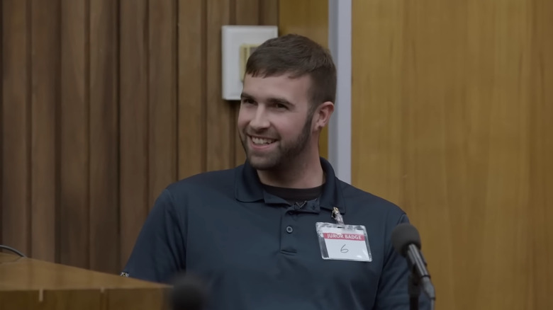 Ronadl gladden smiling on the stand