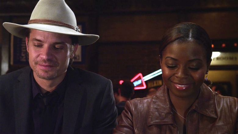 Raylan and Rachel smiling side by side