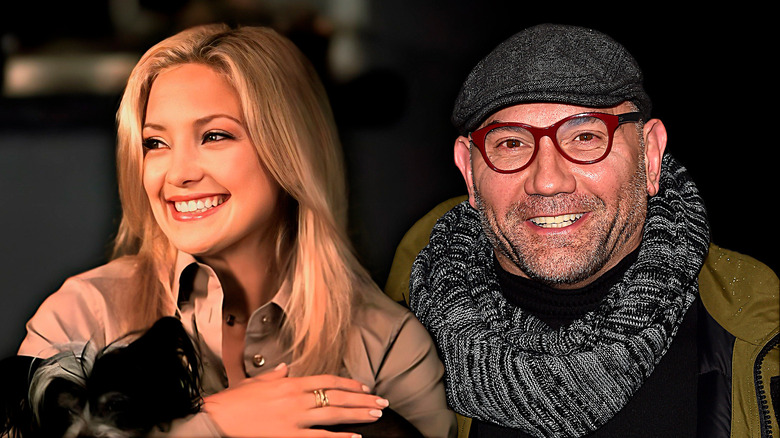 Kate Hudson next to Dave Bautista