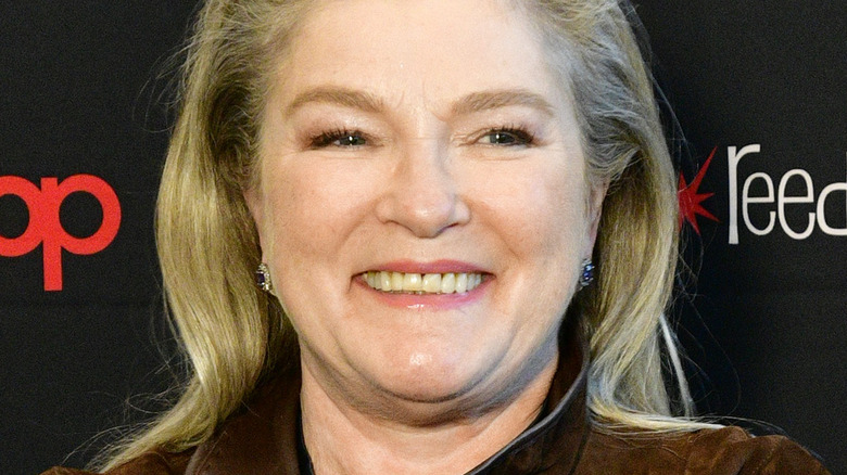 Kate Mulgrew smiling at event