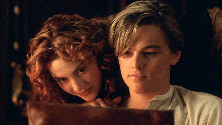 Rose and Jack looking at painting