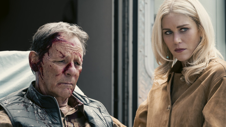 Dolly stands over Tom in his hospital bed in "Marshals" (2026)