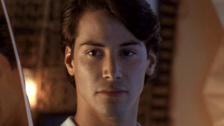 Point Break Keanu Reeve smiling