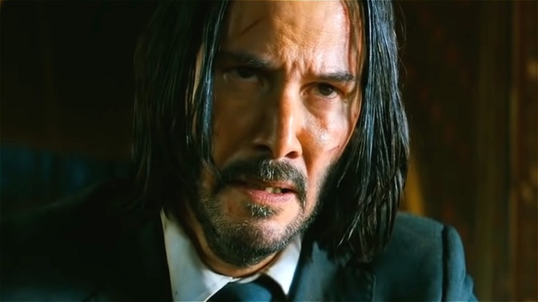 John Wick frowning