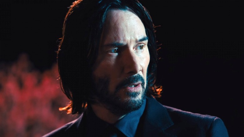 John Wick wearing a suit