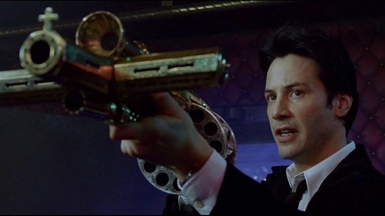 Constantine holds a weapon