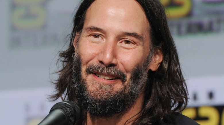 Keanu Reeves smiling