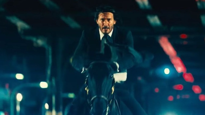 John Wick riding a horse