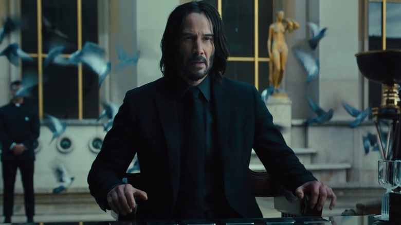 John Wick sitting