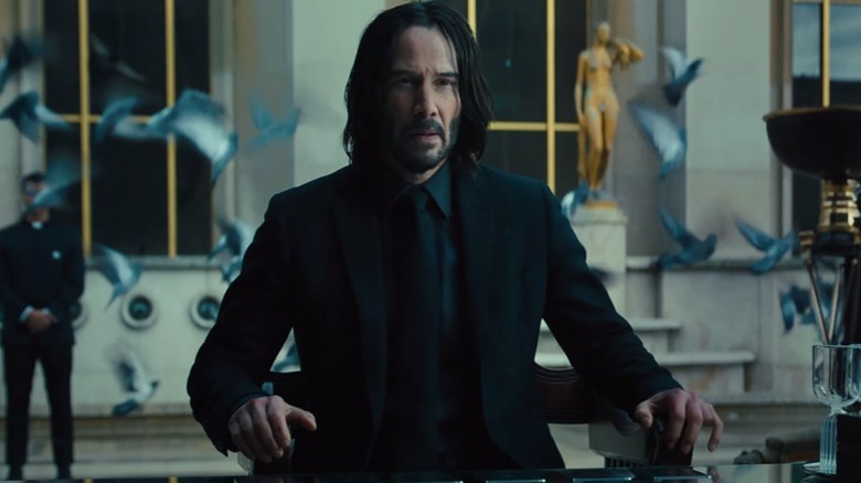 John Wick sitting