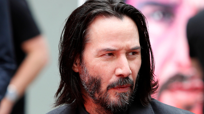 Keanu Reeves looks surprised by art