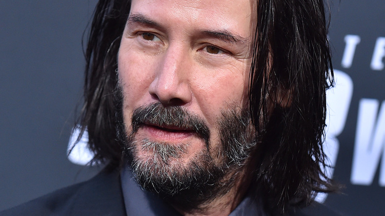 Keanu Reeves with mustache and beard