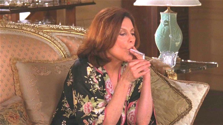 Emily Gilmore smoking on the couch