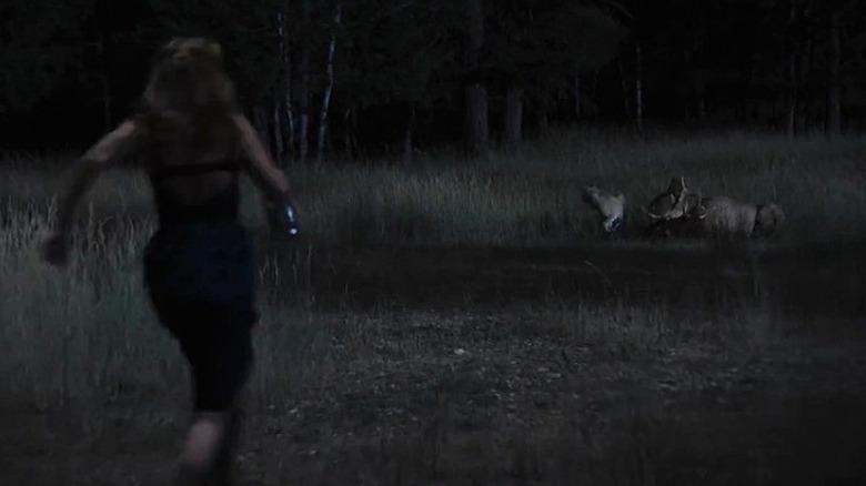 Beth running toward the wolves in 