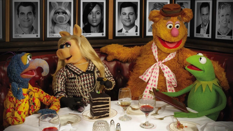 Kermit and friends in an ad for The Muppets