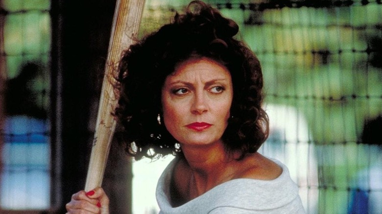 Sarandon swings a bat