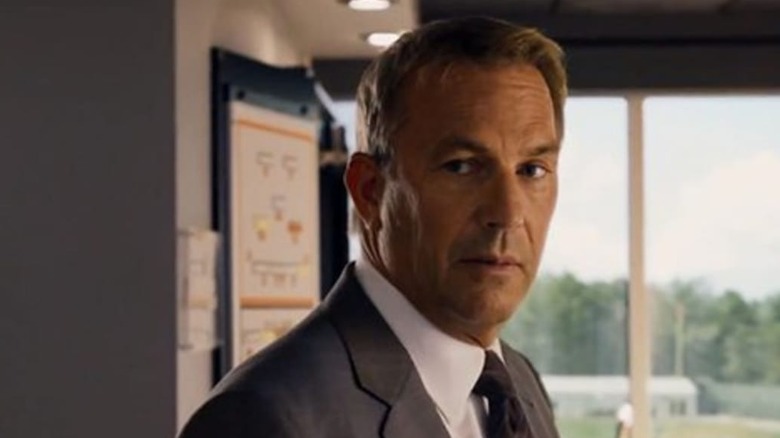 Costner looks over his shoulder