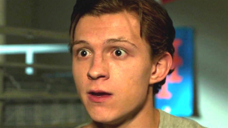 Tom Holland looks surprised as Peter Parker in the MCU