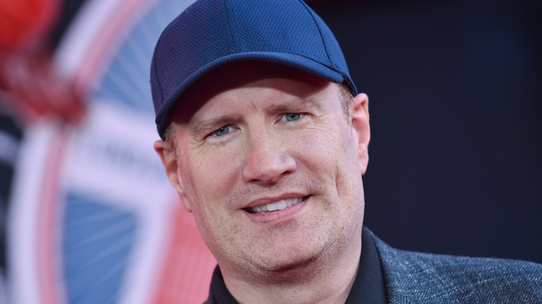 Kevin Feige smiling in a baseball cap