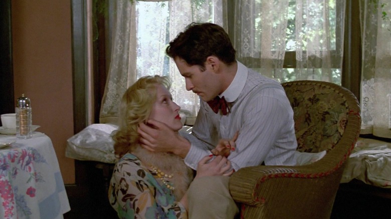 Nathan draping an arm over Sophie's shoulders